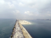 A Western facing view of an uncompleted section of the Great Wall of Lagos from the East end of Eko Atlantic.
