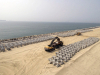 An aerial view of the Accropodes laid out to be placed on the Great Wall of Lagos