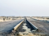 Avenue 2, the artery that is located east of Eko Boulevard and services the Business District is up to stone base level with curbs in place
