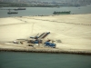 Aerial March 2011 land reclaimed from the sea