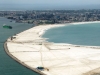 Aerial March 2010 land reclaimed from the sea