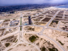 An aerial view of Eko Atlantic showing a number of completed roads, round-a-bouts, canal sections, and even a section of The Great Wall of Lagos. Progress on the project continues. Further you can see the Eko Pearl Towers towards the middle of the image.