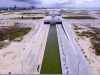 A completed section of the Canal. The expressway on the South Side (right side) has been completed. While the North Side of the expressway remains in its current state to allowed for construction vehicle access.