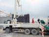 Pneumatic pump sending Concrete to build the bridge mold to cast the Bridge Foundation